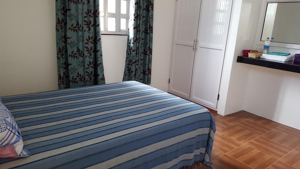Hôtel Chez Johnny - Blue Bay Extérieur photo